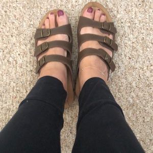 Women’s brown sandals with buckles for adjustment